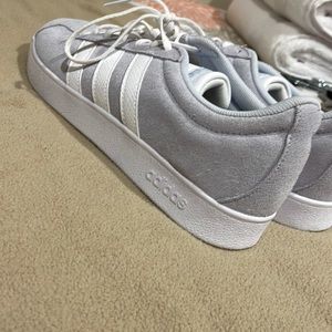 BRAND NEW. NEVER WORN. ADIDAS CASUAL SNEAKERS.